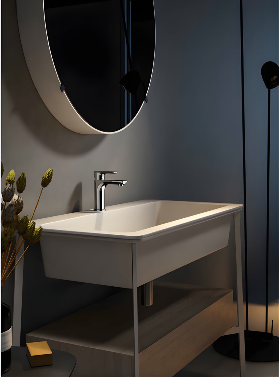 Moly basin and faucet in a warmly lit bathroom
